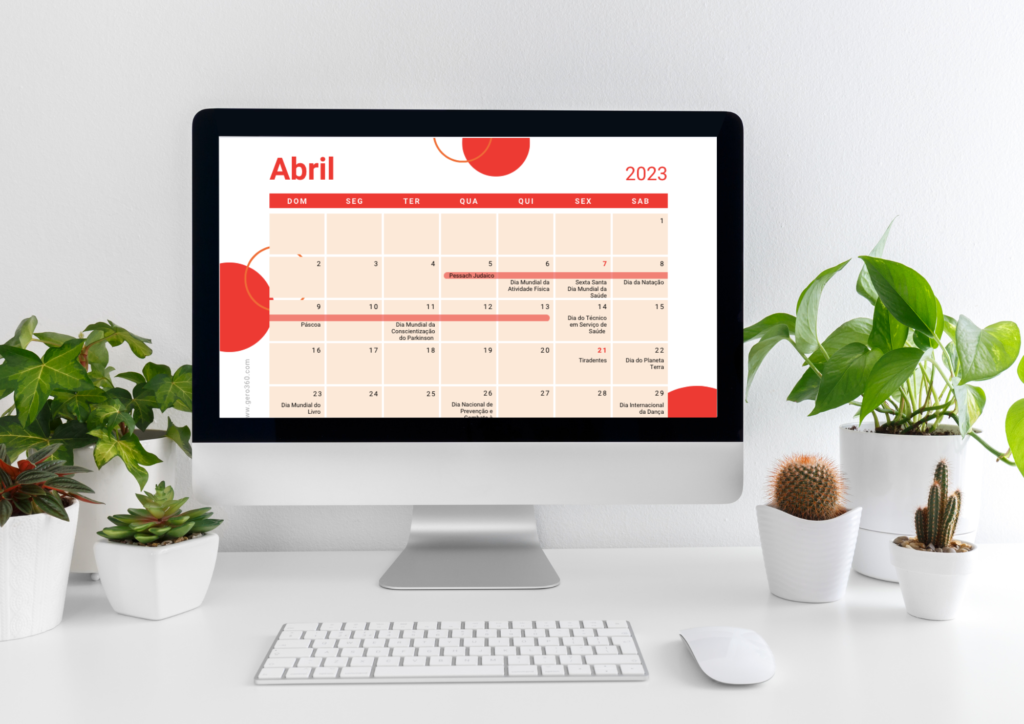 Mesa de Trabalho com Computador, mostrando o Calendário de Abril